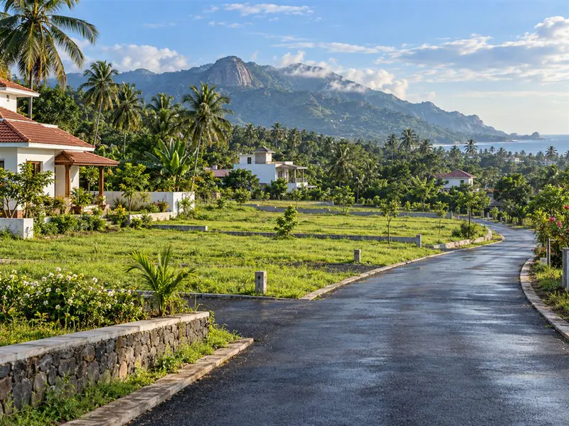 Residential land beside an access road in Kanyakumari district